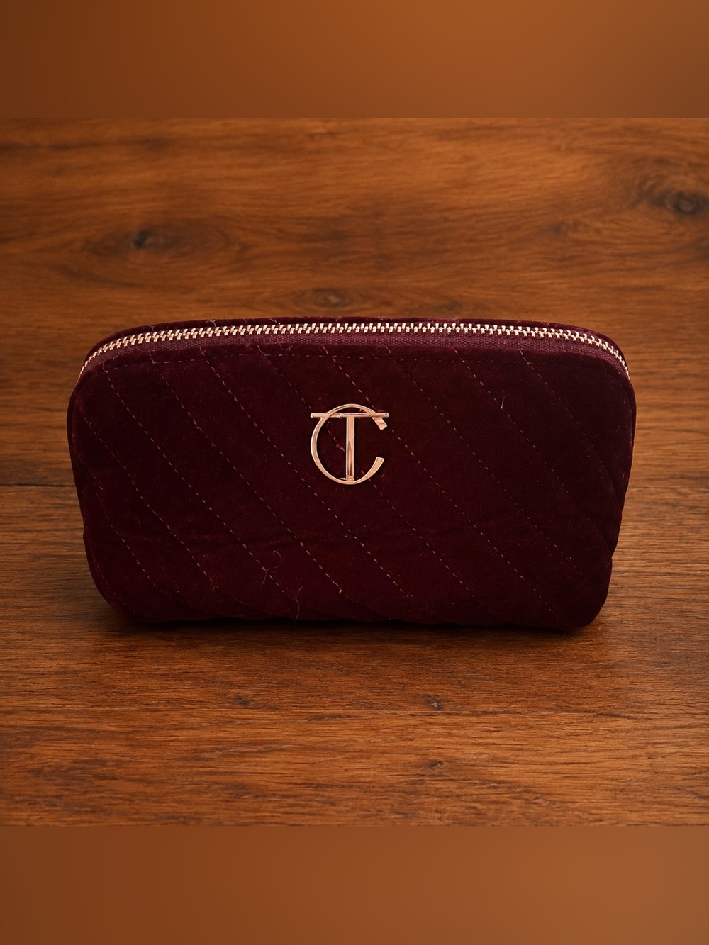Charlotte Tilbury Quilted Velvet Cosmetic Pouch in Burgundy with Gold Logo